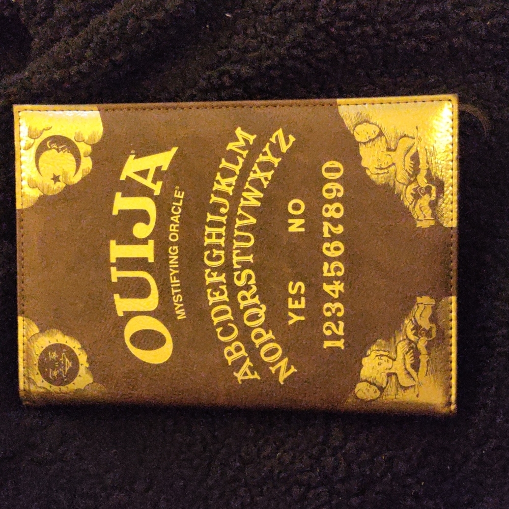 Ouija mystifying Oracle journal.